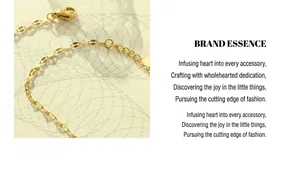Detail of a golden lobster clasp and flat fish-scale chain necklace with polished finish