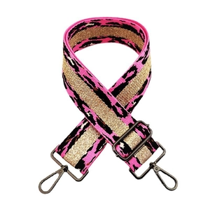 Detail of pink and gold leopard print woven bag strap with metal snap hooks