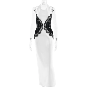 Elegant white halter maxi dress with black lace side panels and a slim silhouette