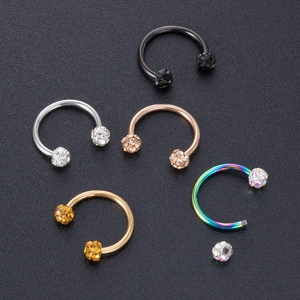 Set of five stainless steel horseshoe rings with crystal balls in multiple colors