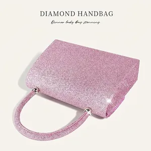 Elegant pink rhinestone evening clutch bag with sparkly glitter and round top handle