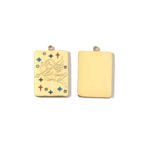 Macro detail of a 14K gold-plated Aries pendant with colorful crystals and Cupid relief