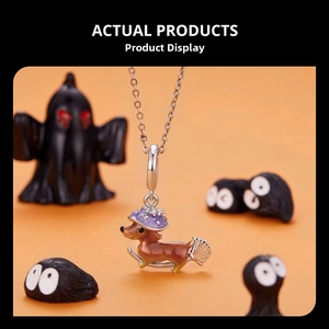 Detailed view of S925 silver dachshund pendant with wizard hat and broom for Halloween