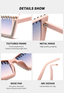 Detail view of pink oversized sunglasses with rhinestones, pearls and metal hinges