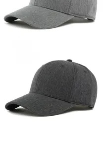 Detail of grey baseball caps in heather fabric showing twill texture and stitching