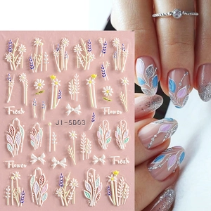Detail showing 5D embossed nail stickers with pink camellia flowers and lavender designs