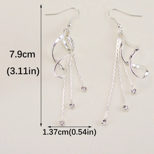 Elegant long tassel earrings with sparkling white rhinestones and silver-toned finish