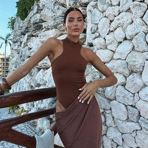 Detail of a dark brown cutout dress with a side slit and form-fitting silhouette design