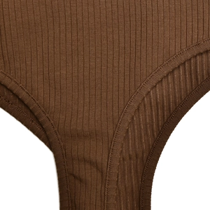 Detail view of brown ribbed cotton bodysuit showing high-quality stitching and fabric texture