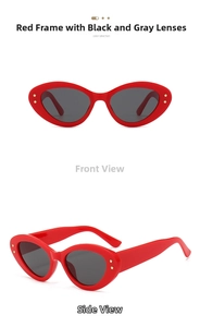 Detail view of red cat-eye sunglasses with gold star rivets and dark grey lenses
