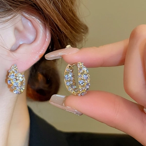 Luxe geometric gold-plated hoop earrings with sparkling light purple and blue crystals