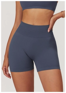 Detail of high-waist seamless sports shorts in slate blue with ribbed waistband