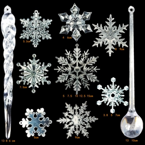 Detail showing various sizes of clear acrylic snowflakes and icicles for tree decoration