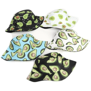 Flat lay showing cotton bucket hats with colorful avocado prints in various base colors