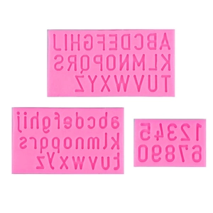 Pink silicone mold set with uppercase, lowercase letters and numbers for cake decorating