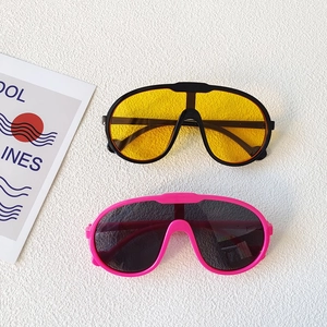 Retro oversized kids sports sunglasses with UV protection in black and pink frames