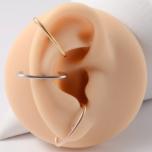 Minimalist C-shaped stainless steel ear cuffs in gold, silver and rose gold finishes