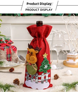 Red burlap Christmas wine bottle cover with cute reindeer and tree applique detail