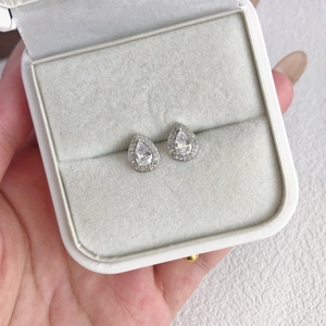 Macro view of S925 sterling silver teardrop stud earrings with 5A cubic zirconia stones