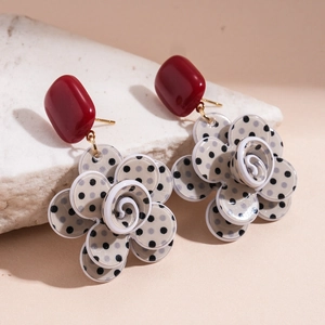 Vintage acrylic floral earrings with red rectangular studs and black polka dot petals