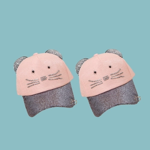 Pink cat ear baseball cap for girls with rhinestone whiskers and glitter brim accents