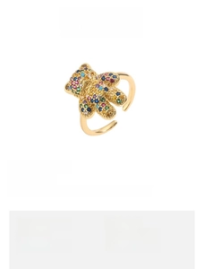 Detail of adjustable open ring featuring micro-pave bear motif with colorful zircons