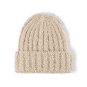 Thick warm winter knitted beanie hat in soft beige mohair style with wide fold-over cuff