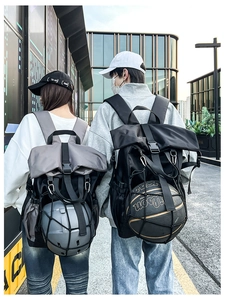 Detail view of the backpack showing the bottom mesh net for a basketball and helmet