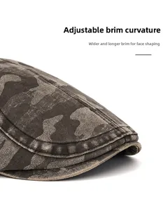 Close-up of foldable long brim on vintage camo newsboy cap with brushed fabric texture
