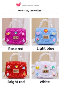 Detailed view of mini silicone jelly crossbody bags with pearl handles and cute DIY charms