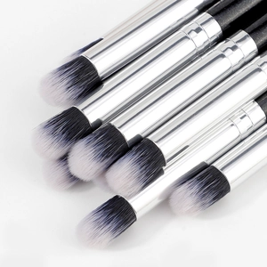 Set of black and silver eye makeup brushes with gradient fibers and glitter handles