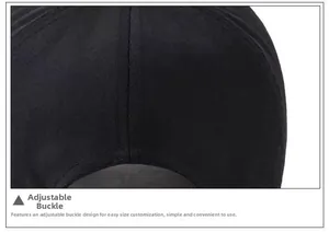 Detailed macro view of the adjustable strap and cotton twill texture on black baseball cap