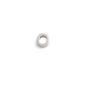 Macro detail of a polished 10mm silver stainless steel circular bead charm for DIY necklaces