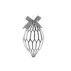 Christmas glass ornament with black and white honeycomb pattern and plaid ribbon bow