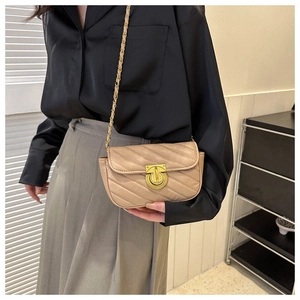 Detail of khaki V-quilted crossbody bag with gold chain strap and metal lock