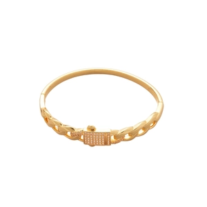 Polished gold plated cubic zirconia bangle with a vintage cuban link chain design