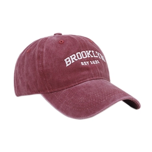 Vintage burgundy washed cotton baseball cap with Brooklyn embroidery on white background