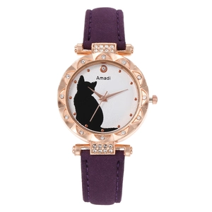Close-up of a rose gold quartz watch with a cat pattern dial and sparkling rhinestones