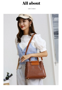 Close-up of brown woven texture and gold hardware on a stylish large tote bag for women