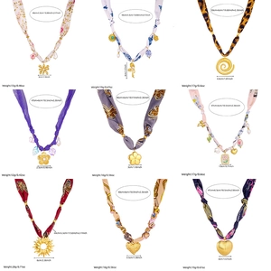Collection of vintage floral silk ribbon chain necklaces with gold-plated pendants