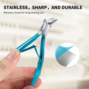 Detailed macro view of sharp stainless steel nipper head with professional brushed finish
