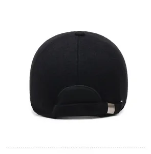 Detail of black winter baseball cap back featuring adjustable metal buckle and warm fabric texture