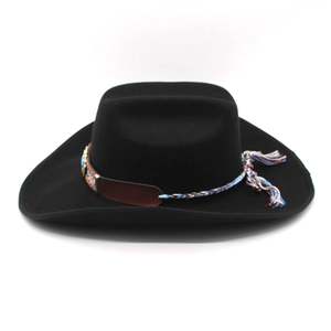 Detail of western cowboy hat featuring ethnic braided band and leather patch
