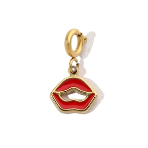 Detail of red enamel lip pendant with gold plating and a sturdy spring clasp hook