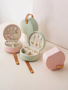 Detail of portable PU leather jewelry box showing interior ring slots and necklace hooks