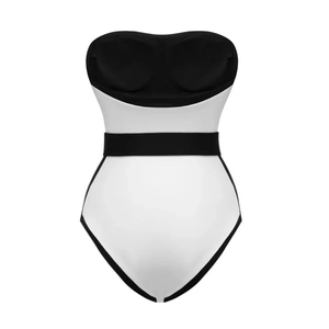 Detail view of monochrome one-piece swimsuit featuring black band and white high-cut bottom