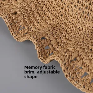 Detail of hand-woven straw hat brim with built-in memory wire for flexible styling