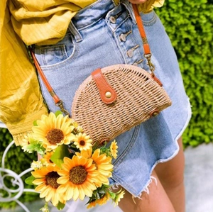 Handmade semi-circular straw crossbody bag with brown leather strap for summer beach