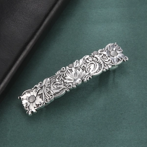 Vintage rectangle sunflower hair clip with embossed floral pattern in antique silver