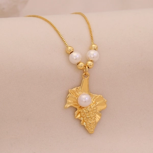 Exquisite gold ocean shell necklace with large white pearl and leaf shape pendant